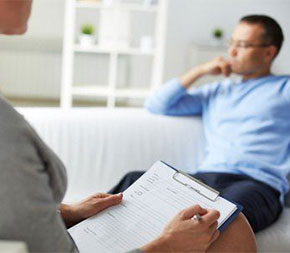 psychologist or psychiatrist with patient