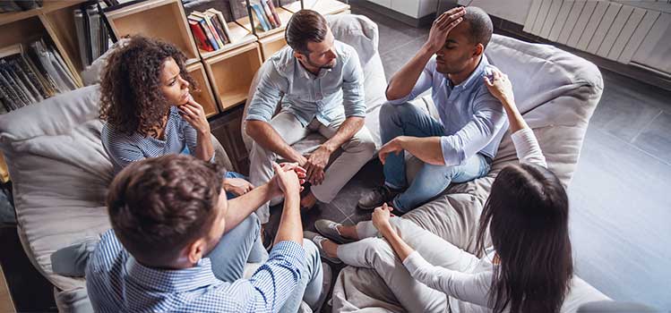 New York substance abuse counseling group comforts man who has relapsed