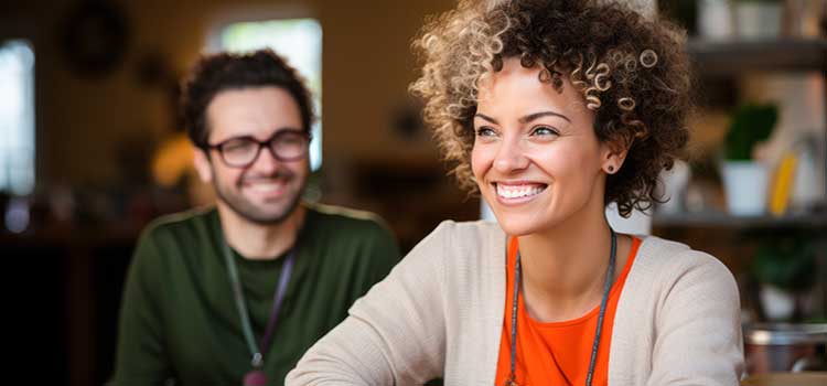 two human services workers share down time
